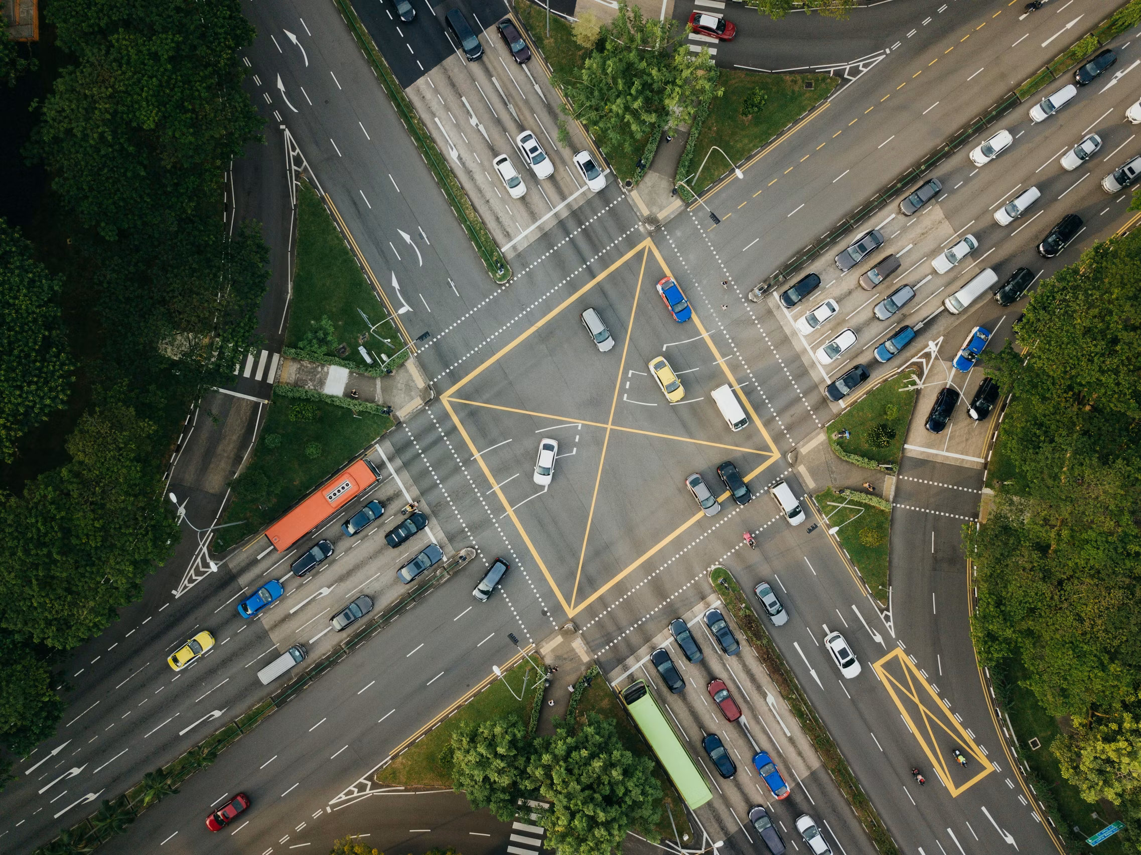https://unsplash.com/photos/low-angle-photography-of-vehicles-passing-road-at-daytime-4YdbwhmTMn0